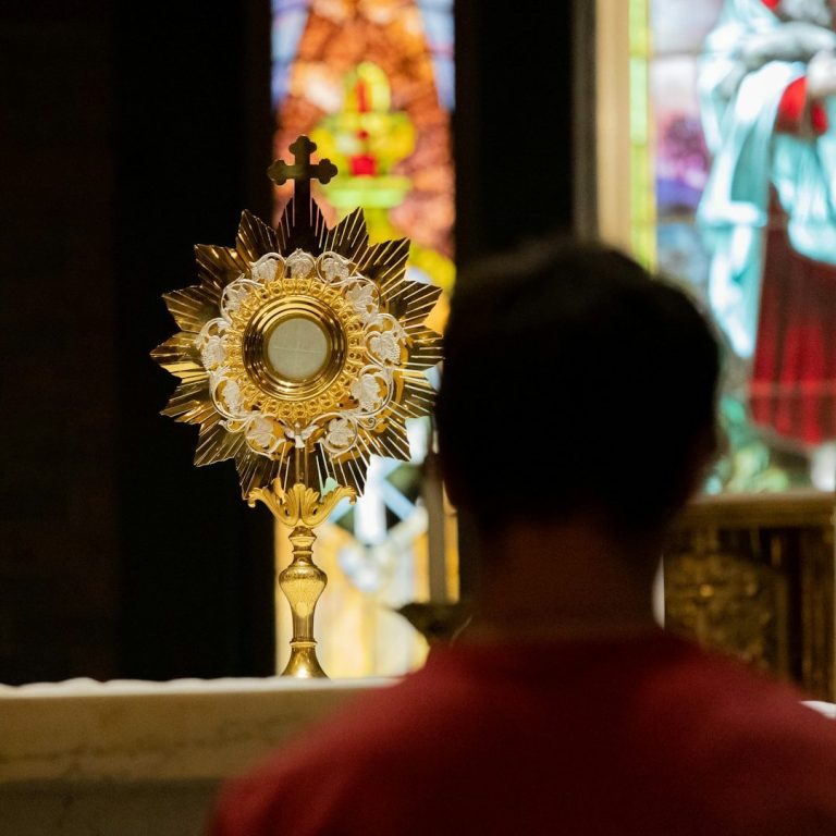 Adoration Prayer A Eucharistic Adoration centerpiece on an altar