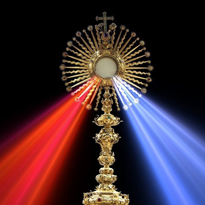 Divine Mercy Prayer A Eucharistic Adoration piece with red light on one side and blue light on the other